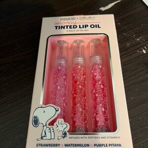 Peanuts x celavi snoopy tinted lip oil 3 piece lip oil set